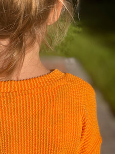 Orange ghost jumper